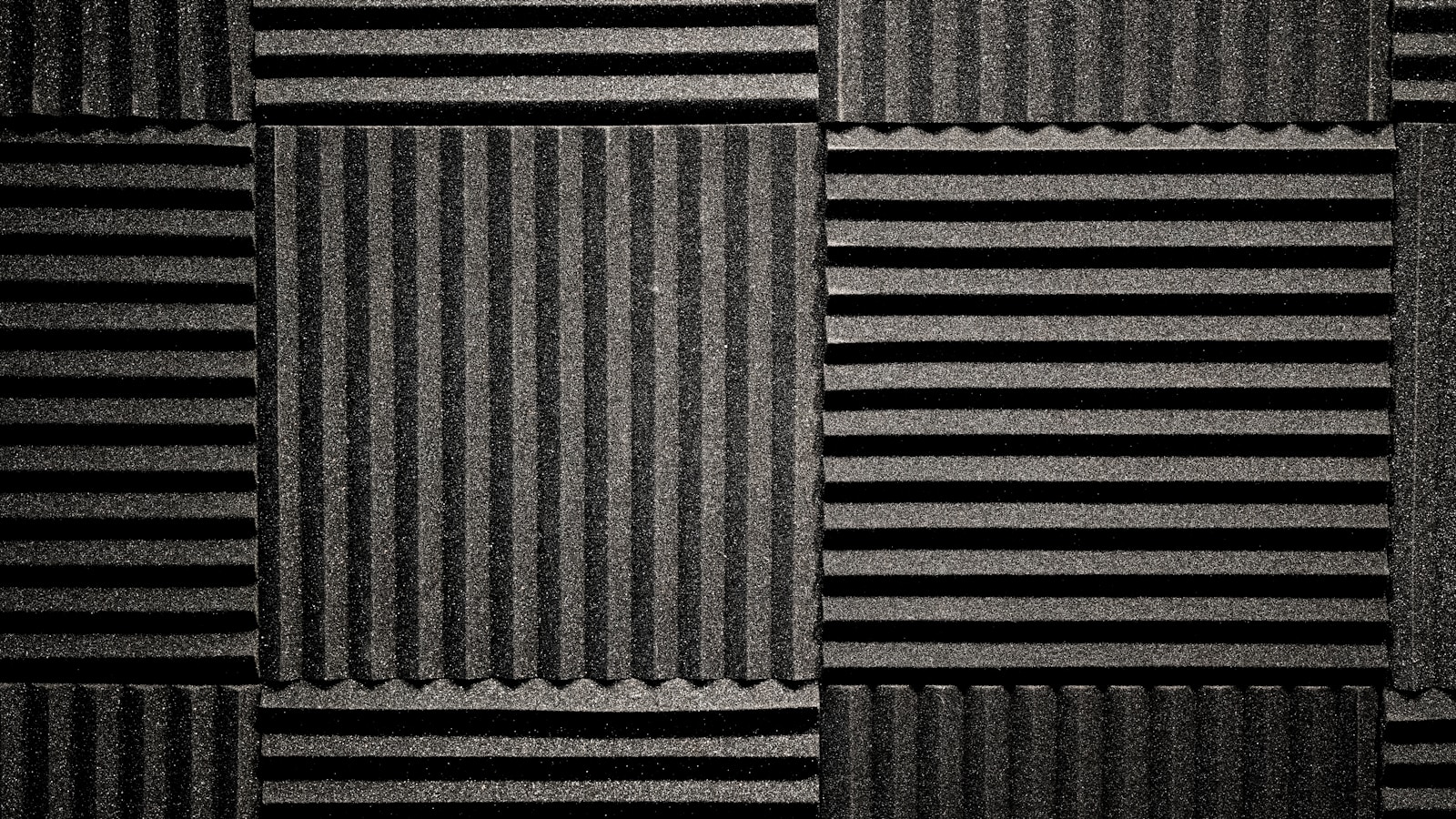 Acoustic foam panels and bass traps in a home studio