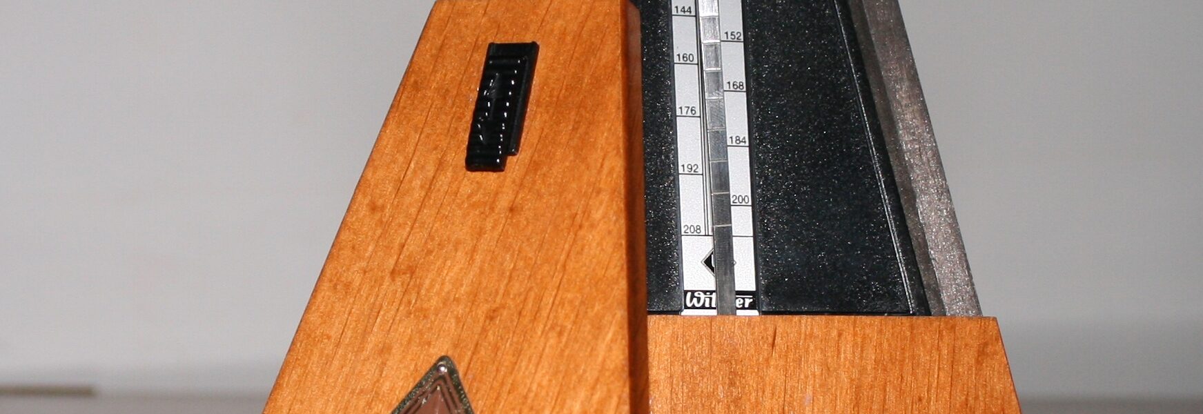 wooden metronome piano