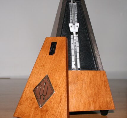 wooden metronome piano