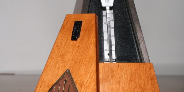 wooden metronome piano