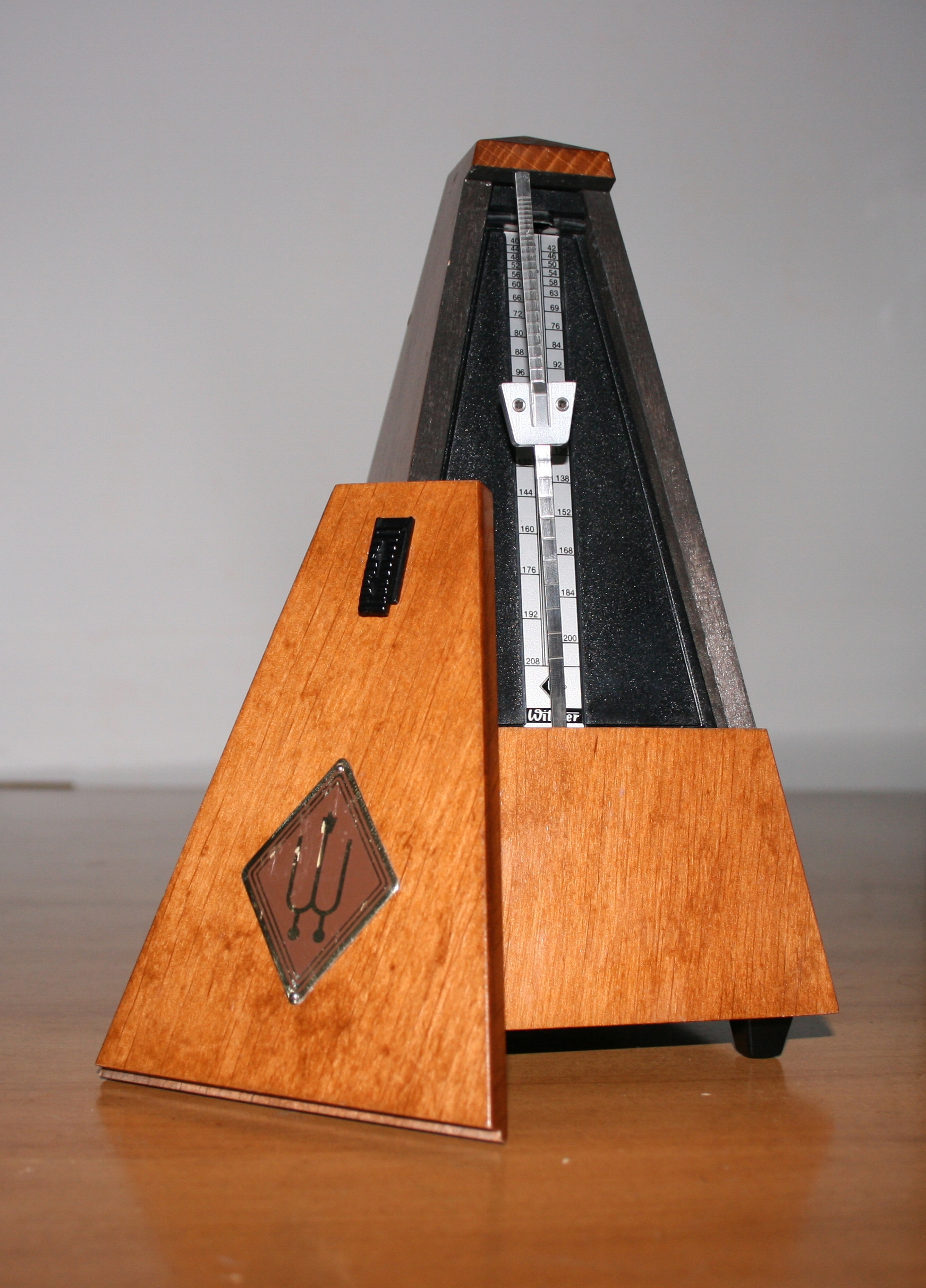 wooden metronome piano